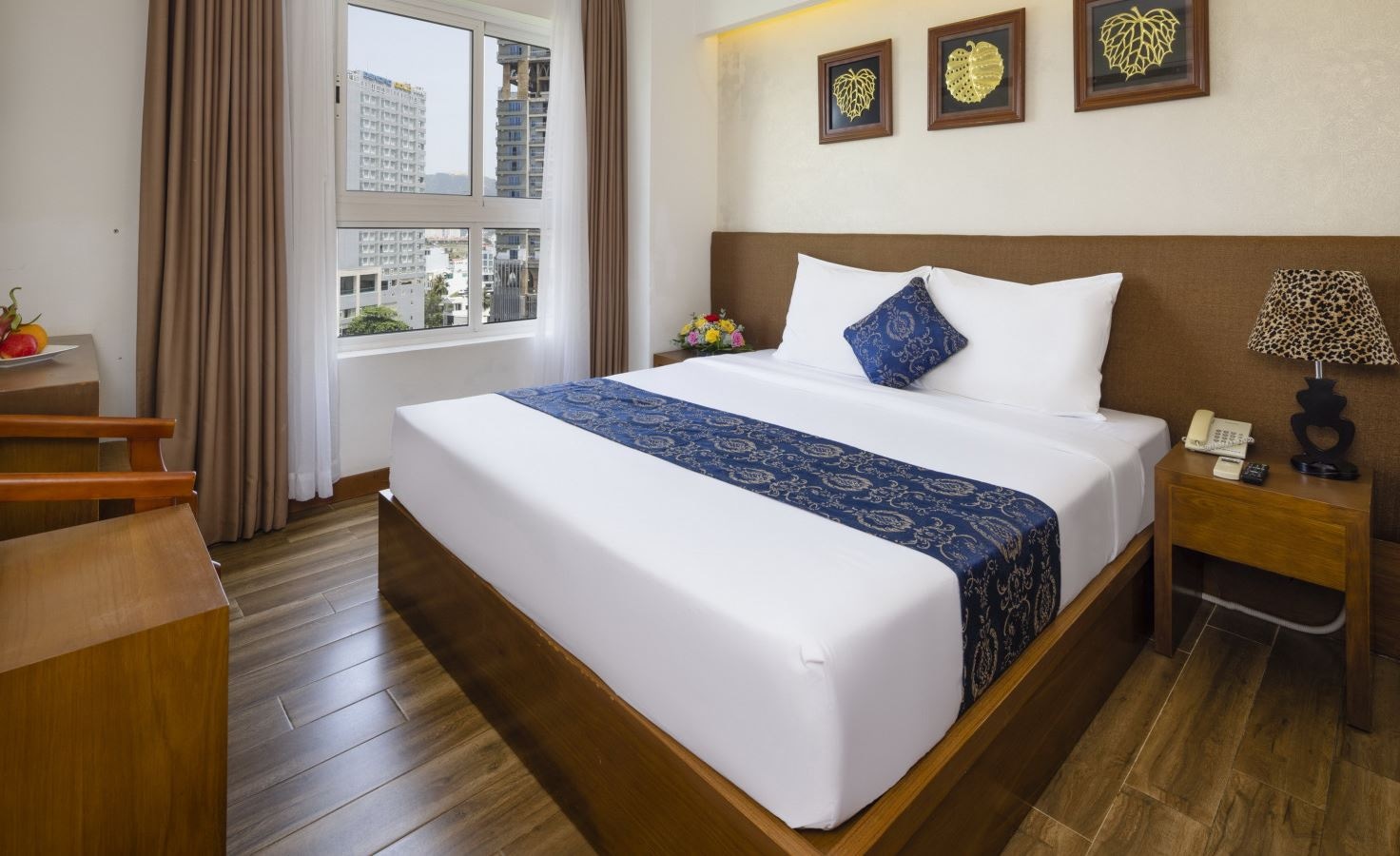 rooms-room-deluxe-cityview-child-without-extra-bed