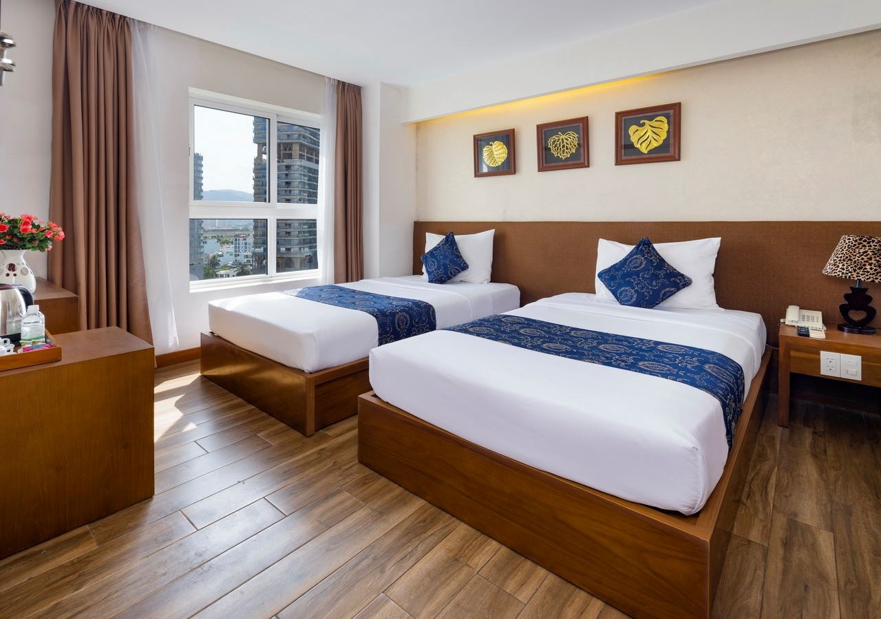 rooms-room-deluxe-cityview-child-without-extra-bed