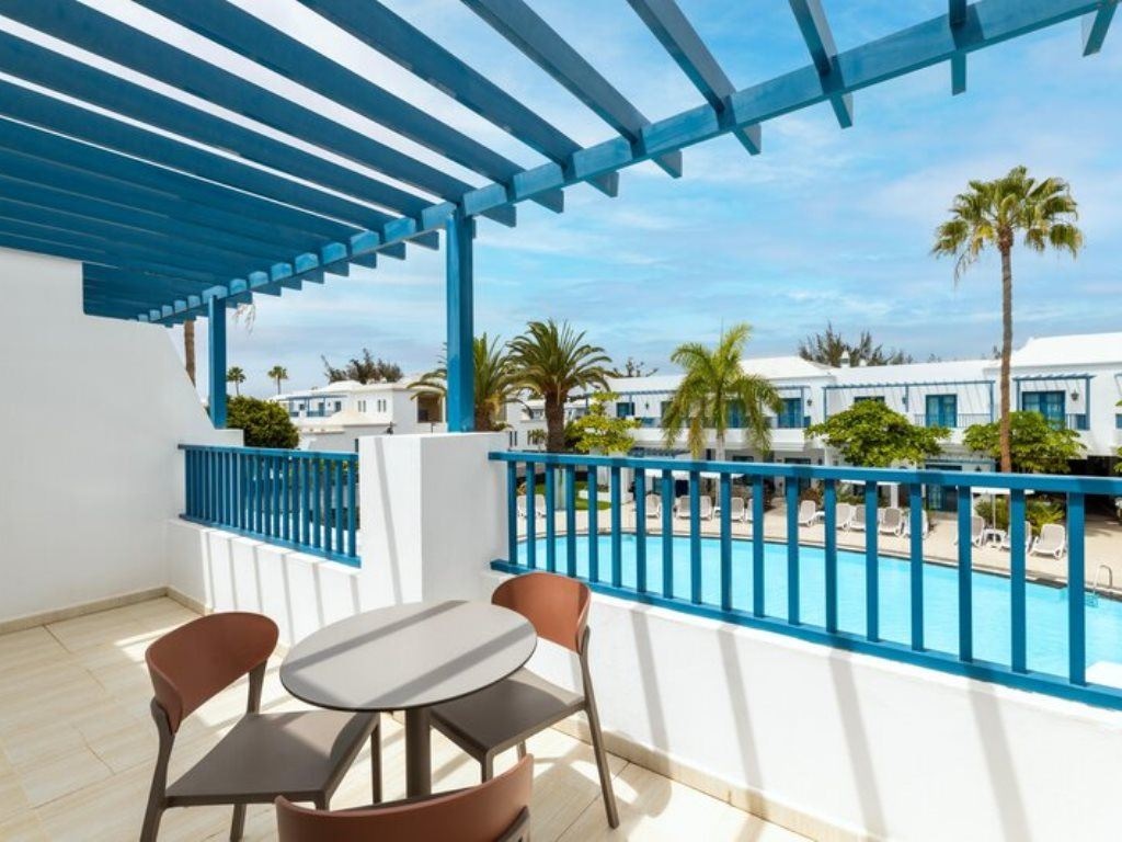 rooms-a1p-renovated-pool-view-deluxe-pool-view-1-bedroom-with-balcony-or-terrace